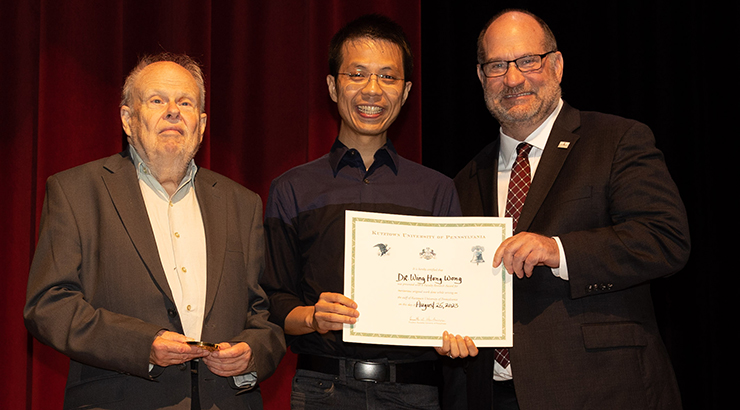 Wong presented award from Dr. Chambliss and Dr. Hawkinson.