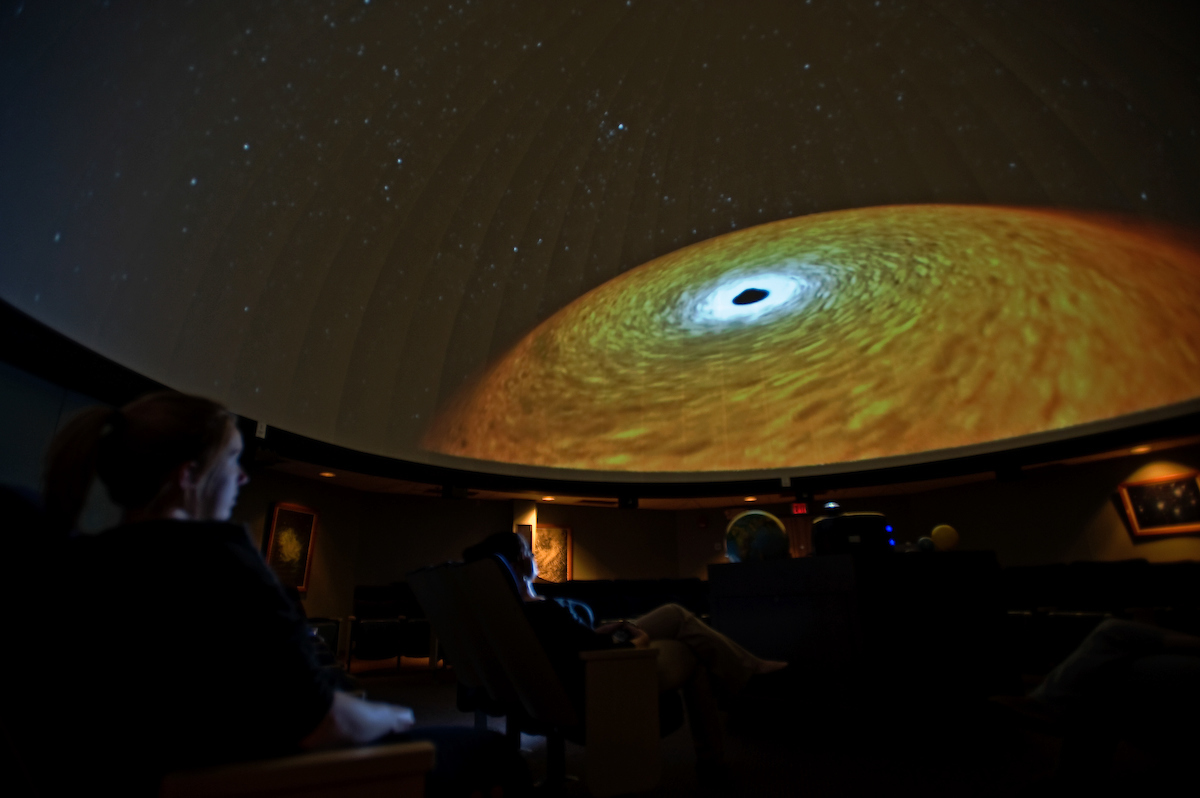 View of a black hole on the planetarium dome