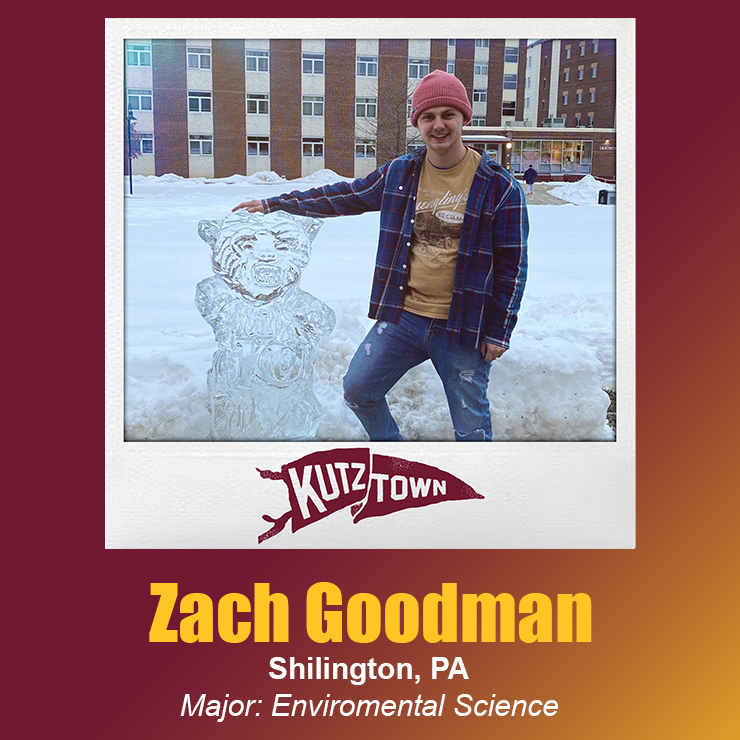 Zach Goodman smiling and standing next to an ice sculpture of a roaring bear, his hand on its head, with his name and major, Environmental Science, listed below the picture  