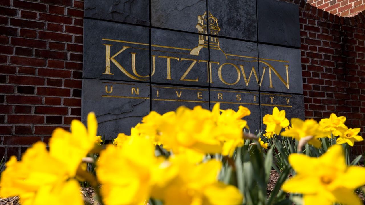 Kutztown Sign with Daffodils