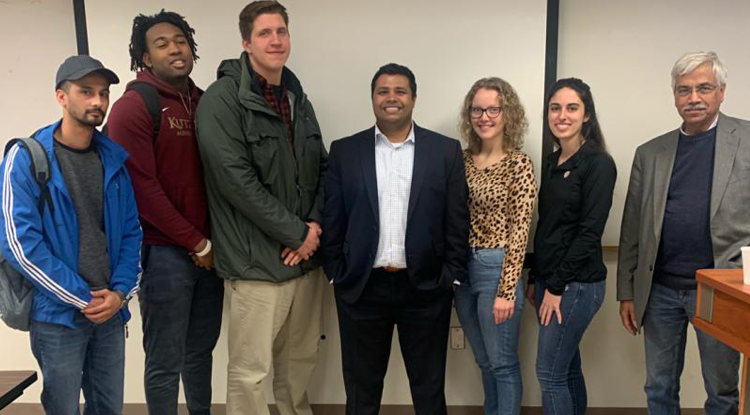 (L-R) Nawaraj Panthi, Evan-Eric Longino, Stephen Steele (marketing officer), Jenith Jacob (guest speaker from Hamilton lane), Kelly Slattery, Hanna Templin, Dr. Keshav Gupta 