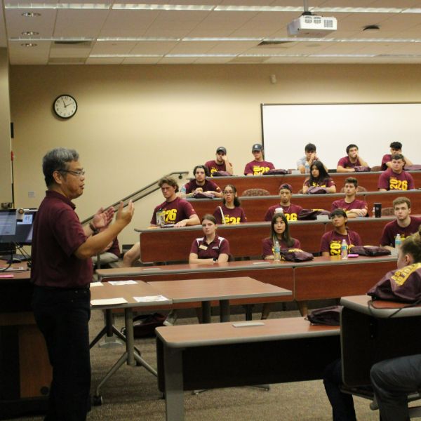 KU freshman listening to Dr. Chao explain the Amazing Academic Race.