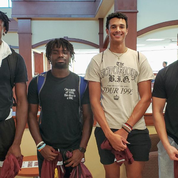 A group of KU freshman poses together.