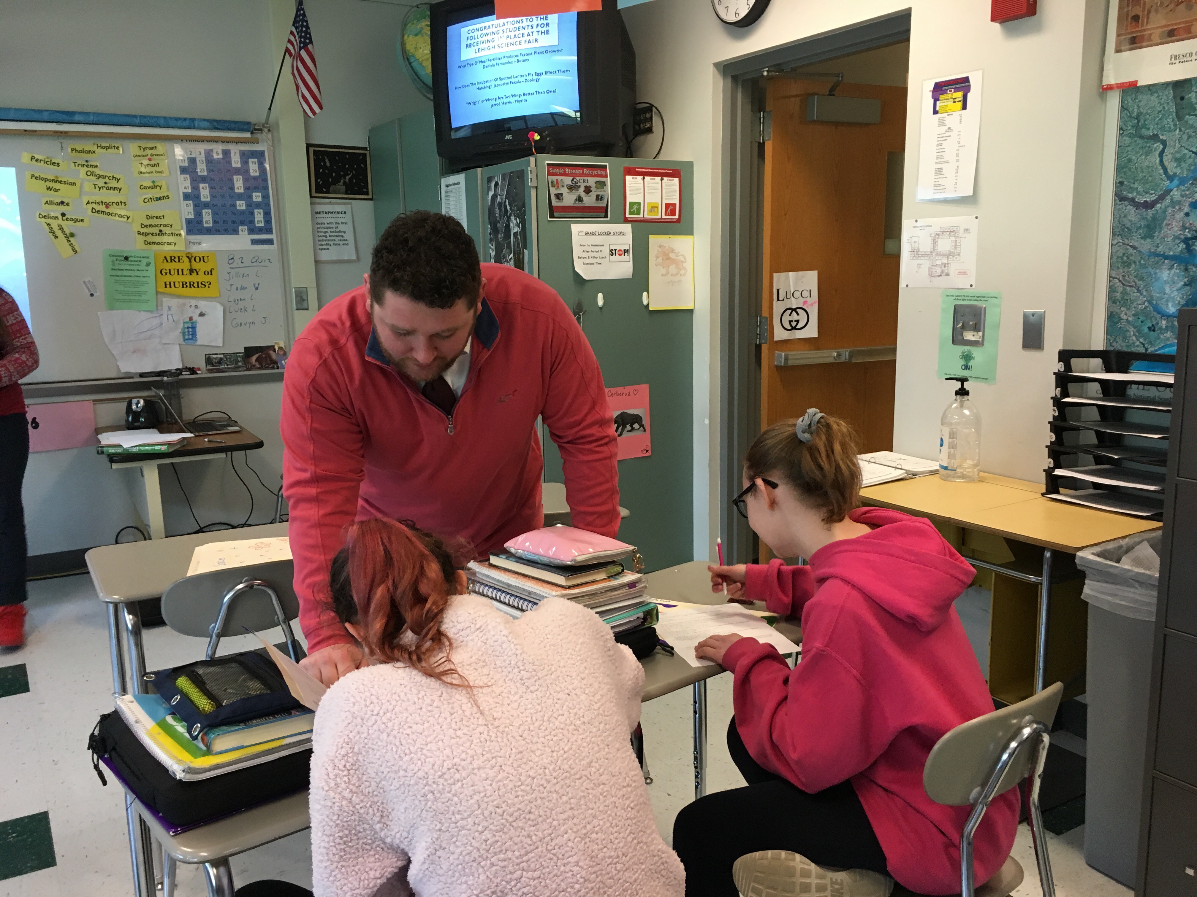 Male student teacher instructing students at Orefield Middle School