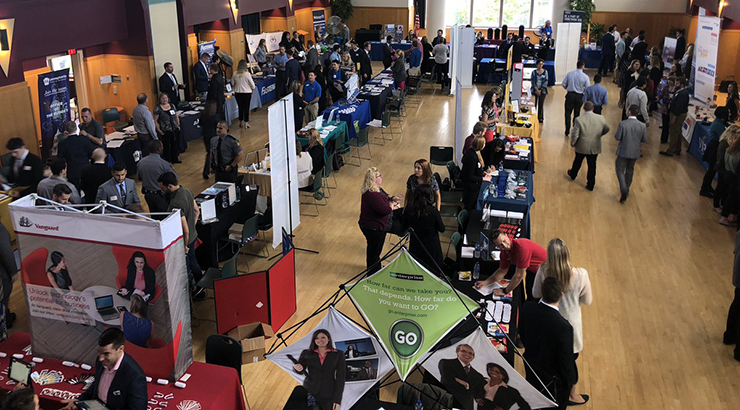 Overhead shot of people interacting at a job fair