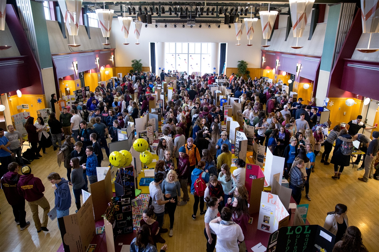 Overhead view of Kutztown Involvement Fair with tables for different student organizations set up around the Multipurpose Room in McFarland Student Union Building