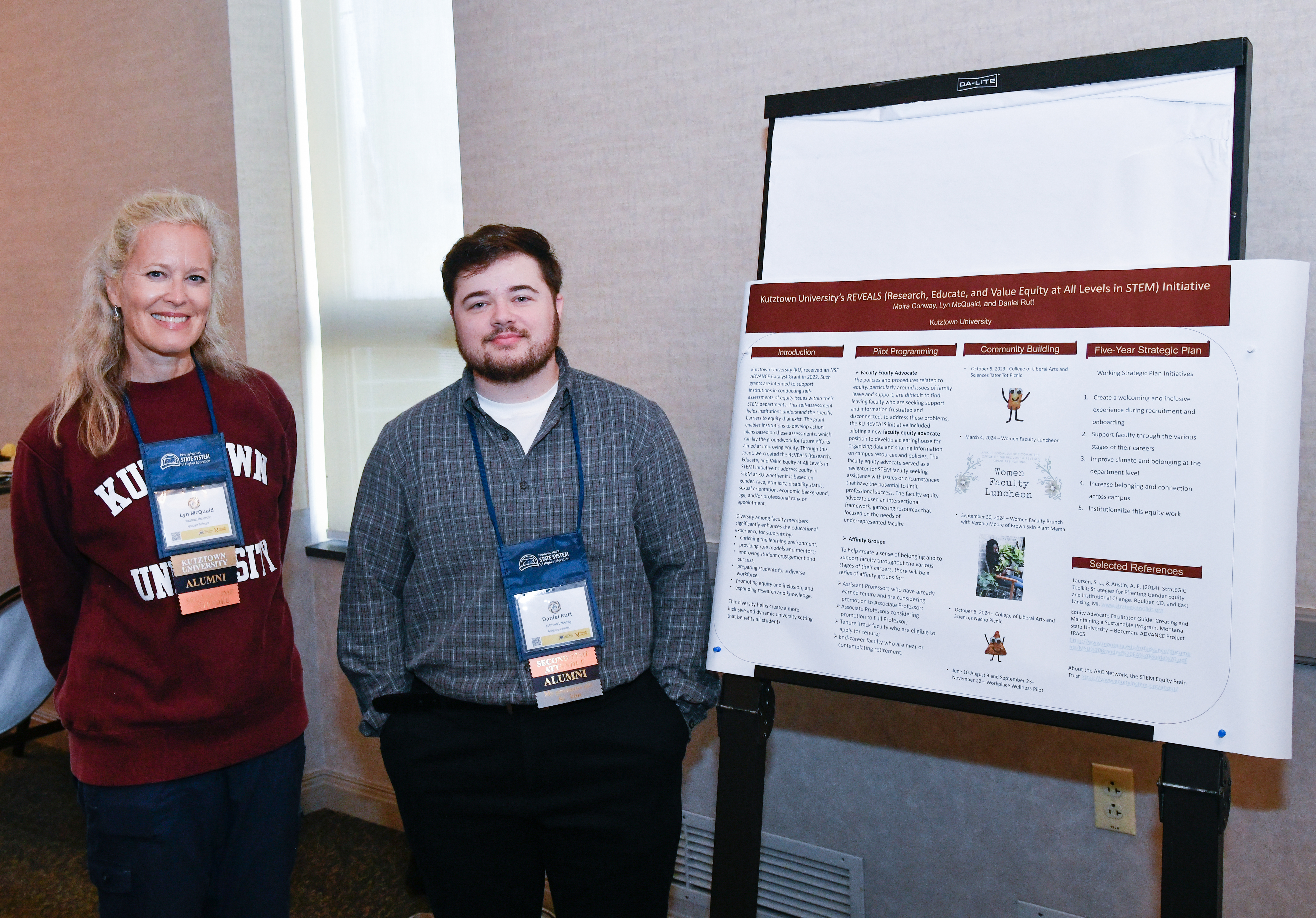 Dr. Lyn McQuaid & Mr. Daniel Rutt next to poster presentation, PASSHE Summit