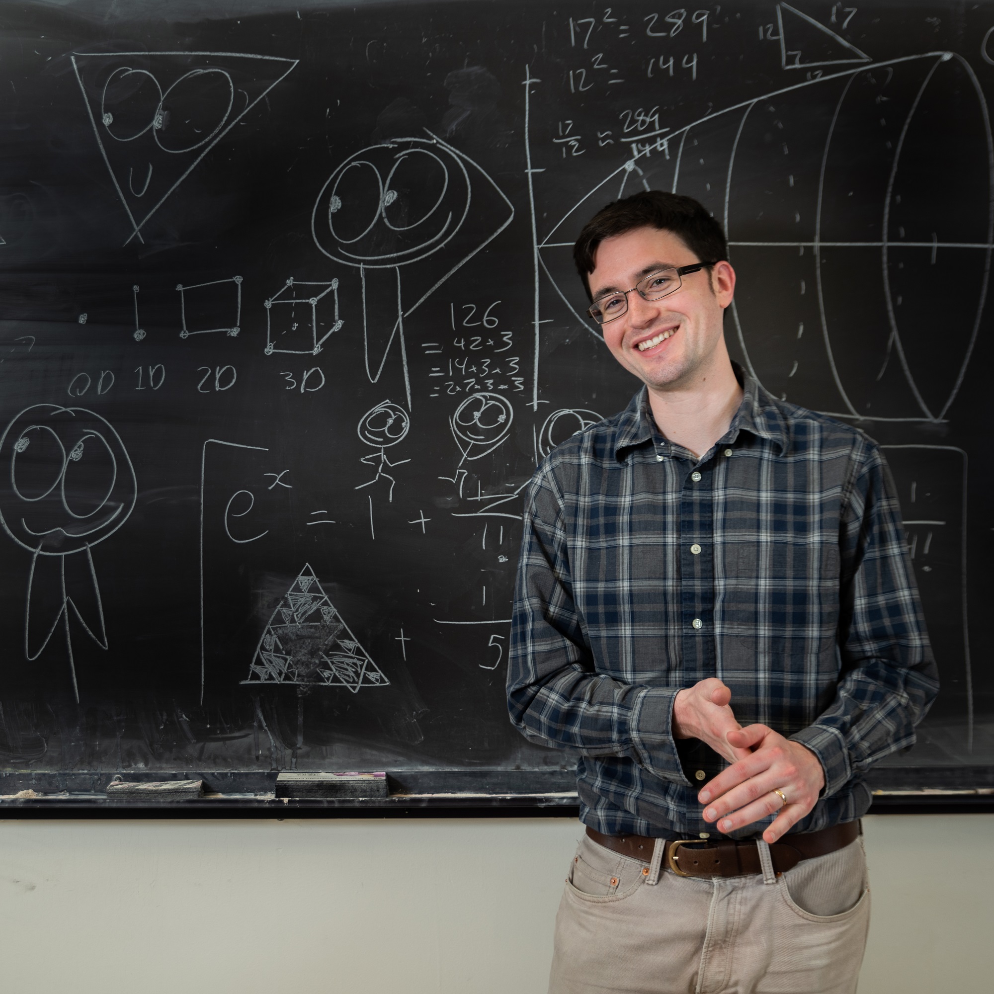 Student presenting his research at a conference