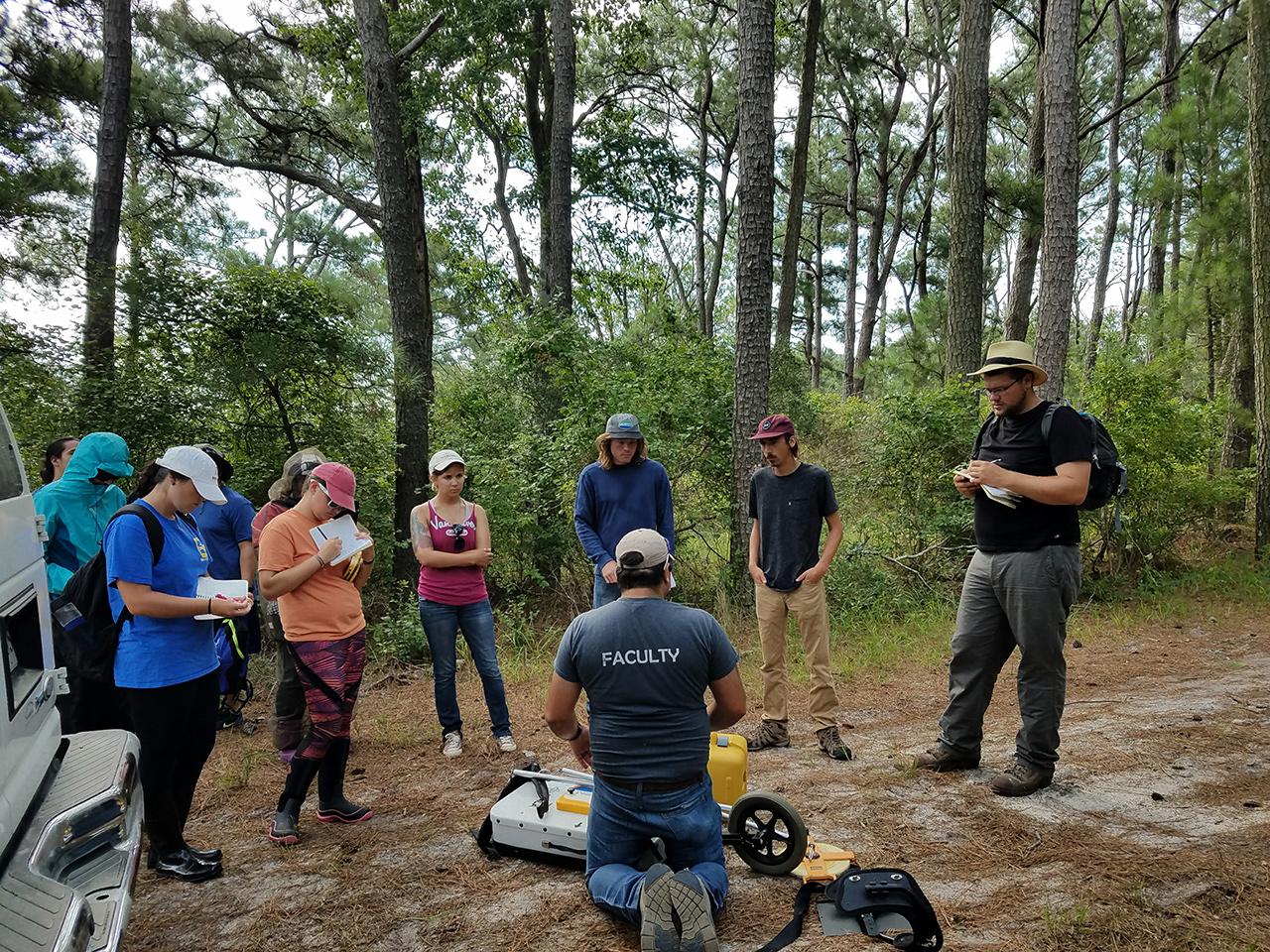 Students in the maritime forest with GPR