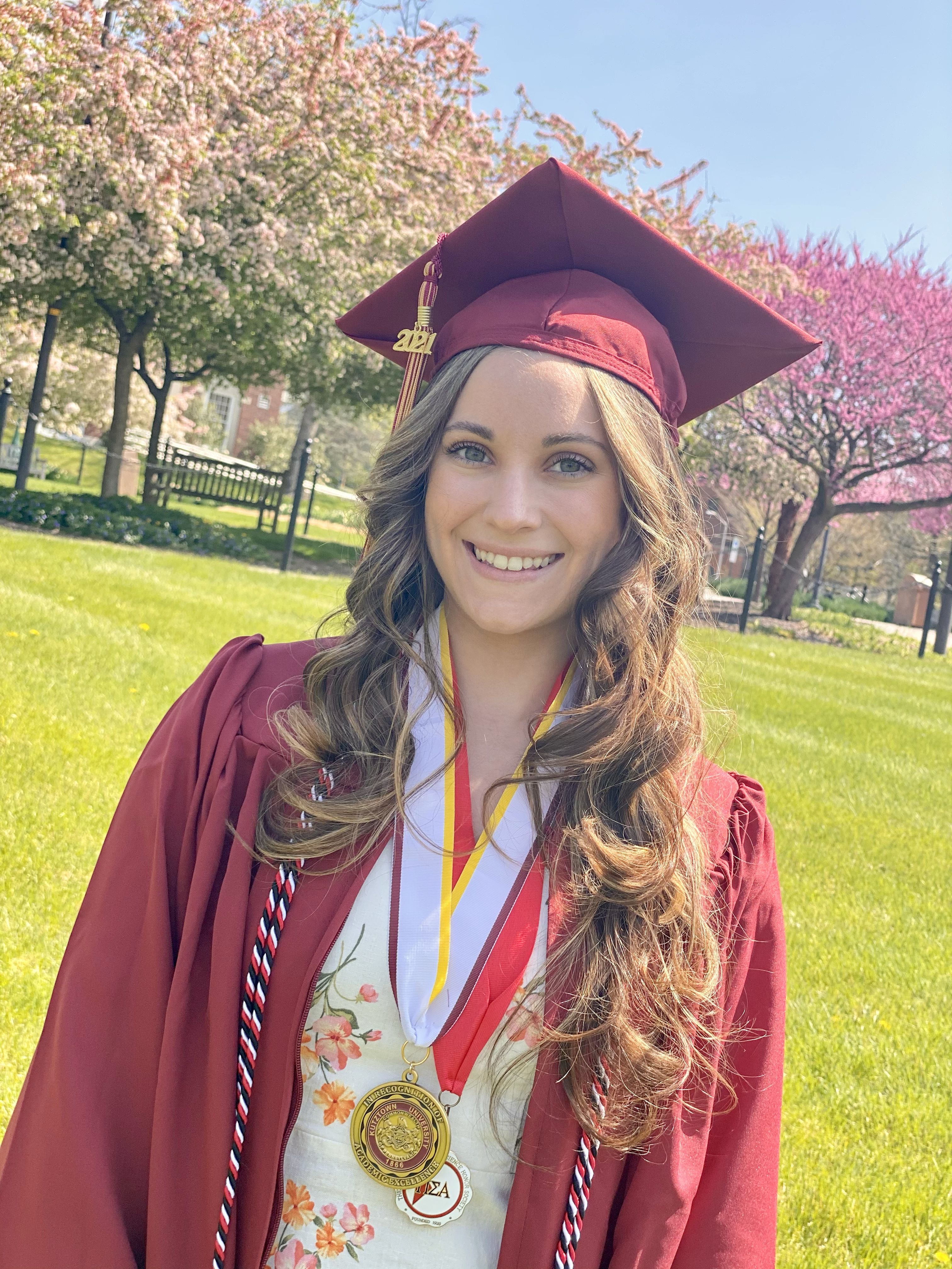 Alum Emily Smolinsky wearing KU regalia 