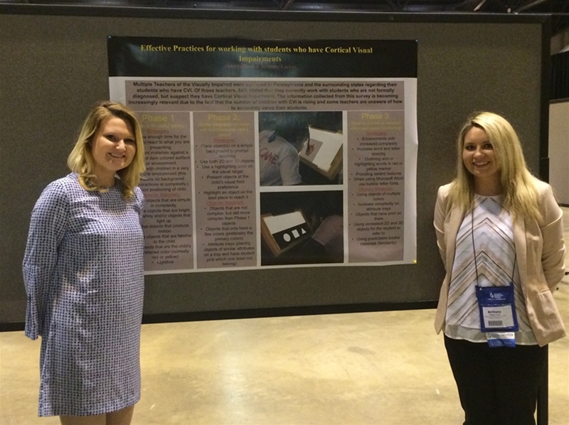 Two female students presenting their project on "effective practices for working with students who have cortical visual impairments." at the  Council for Exceptional Children National Conference, Saint Louis, 2016