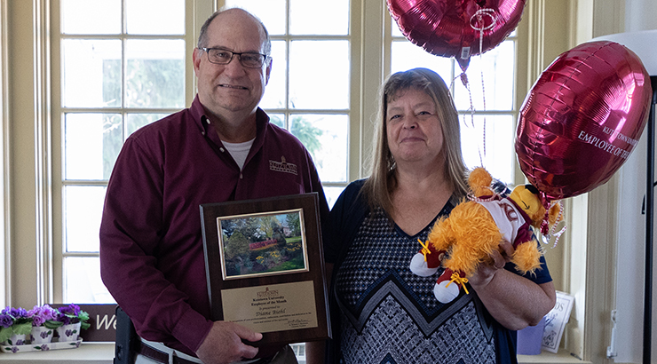 President on left, Biehl on right accepting award.