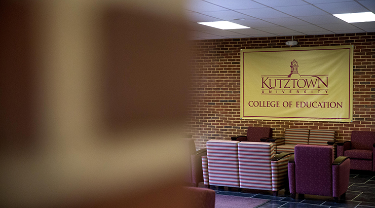 KU College of Education banner in lobby.