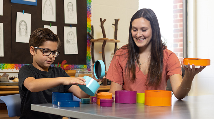 Teacher and student in classroom