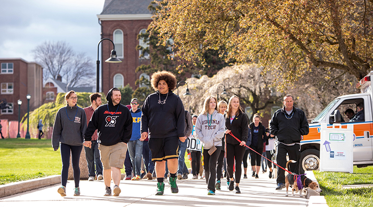 People walking on campus.