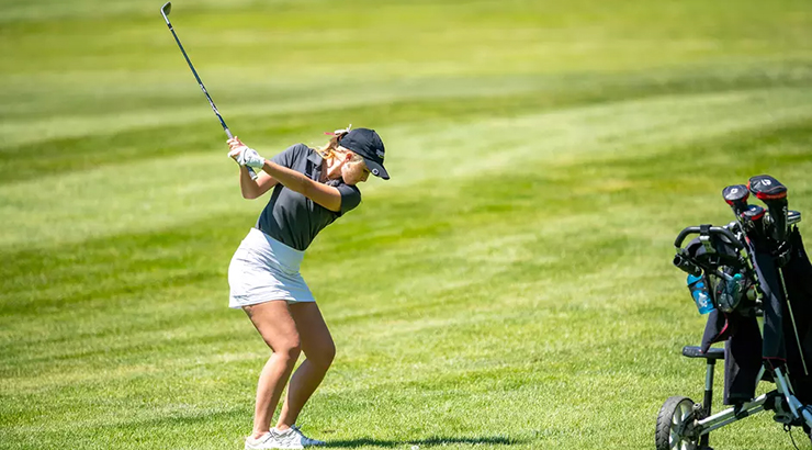 Golfer taking swing