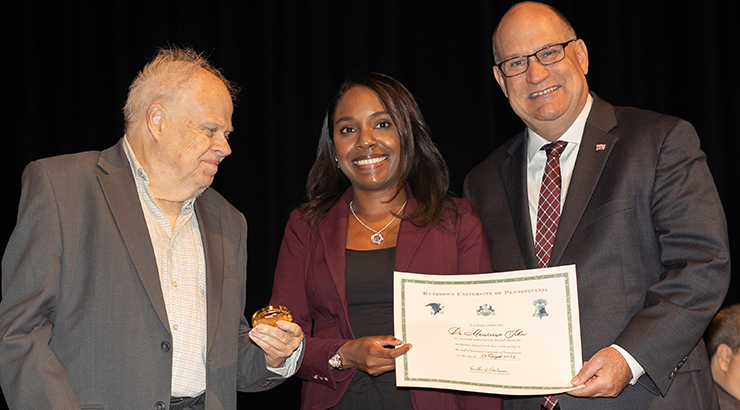 Recent Chambliss award recipient, Mauricia John, with Dr. Chambliss and President Hawkinson