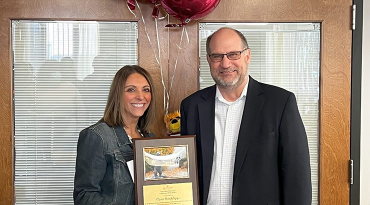 Sanfilippo presented awards from President Hawkinson