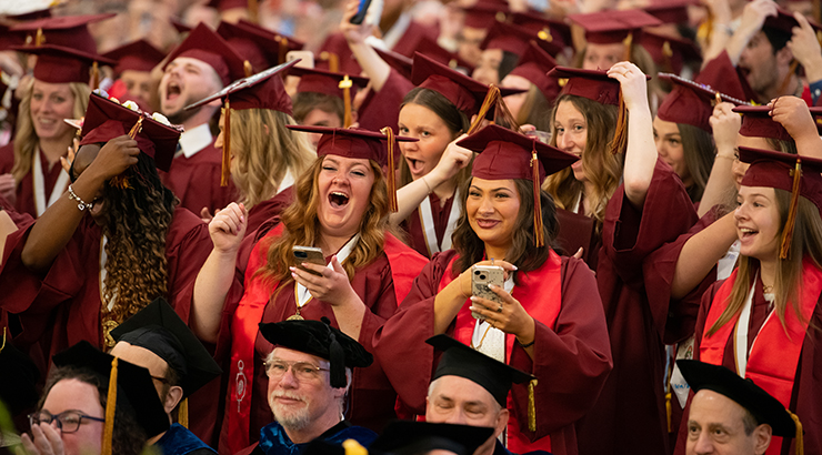 Kutztown University students celebrating graduation