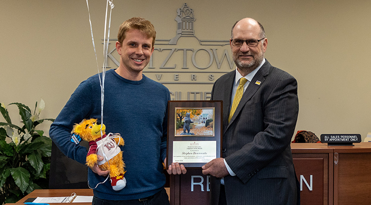 Hawkinson presenting awards to Benvenuto