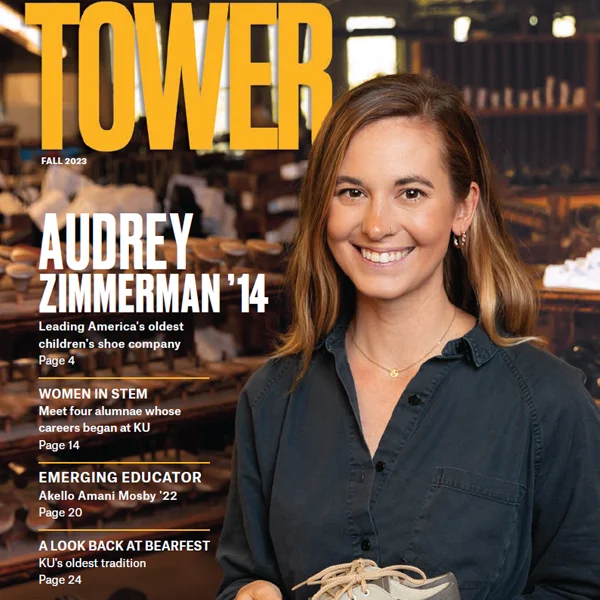 Cover of latest tower magazine, shows smiling graduate, with tower logo and story titles.