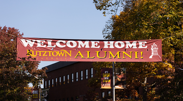 Maroon banner, Welcome Home Kutztown University alumni