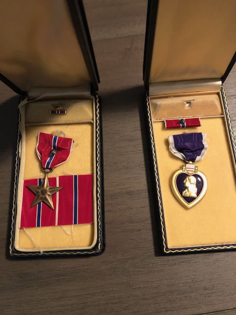 A picture of the Bronze Star and Purple Heart Medals that was awarded to Private First Class Eake DeMarco