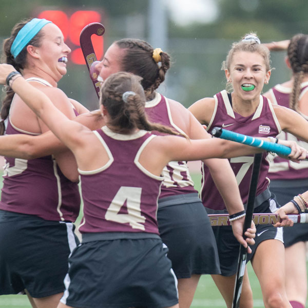 Field Hockey players celebrating