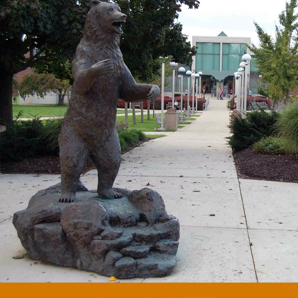 KU bear statue in front of library