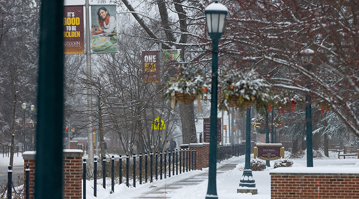 Snow on campus sidewalks