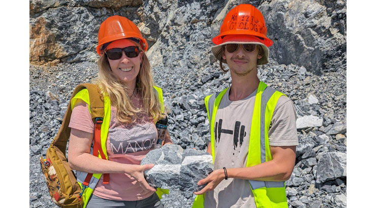 Dr. Adrienne Oakley (left) working with a geology student in an active limestone quarry