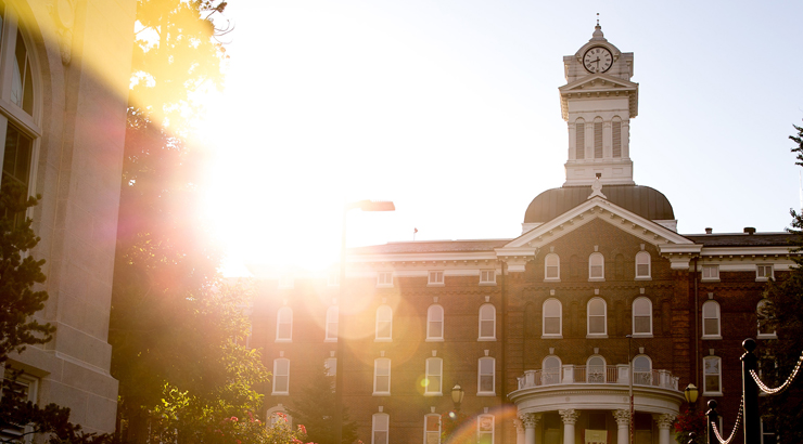 Old Main with sun in background