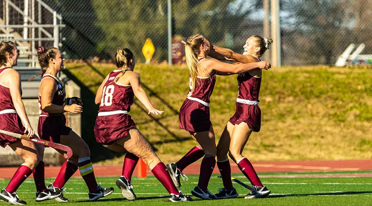 Team celebrating on field