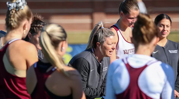 Team huddle on field