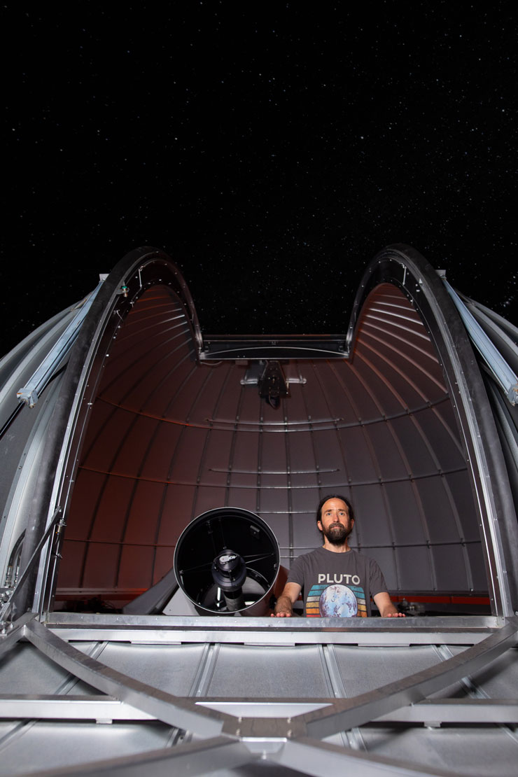 Dr. Phill Reed looks out from inside the Chambliss Observatory.