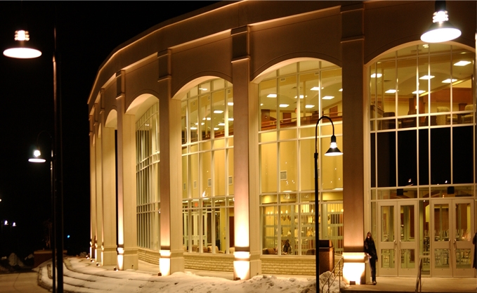 Front entrance of the Academic Forum at night 