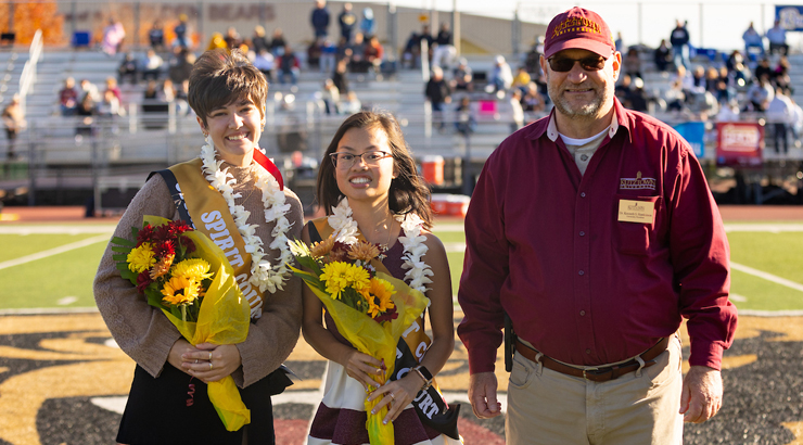 Spirit Court Champions Karleigh Patton, Elizabeth Kolb, with President Hawkinson