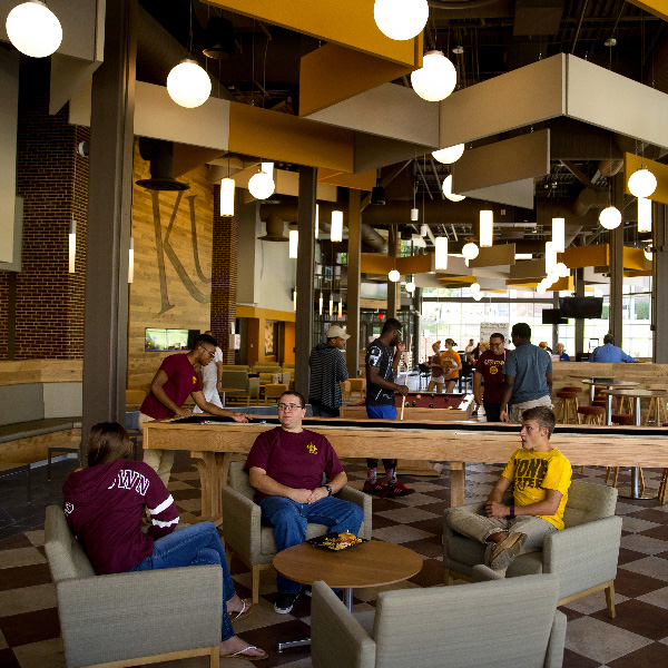 students relaxing in south dining hall