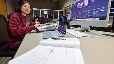 Kutztown University film major working on project in on-campus lab.
