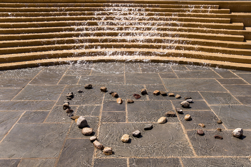 rocks on Alumni Plaza arranged into heart shape.